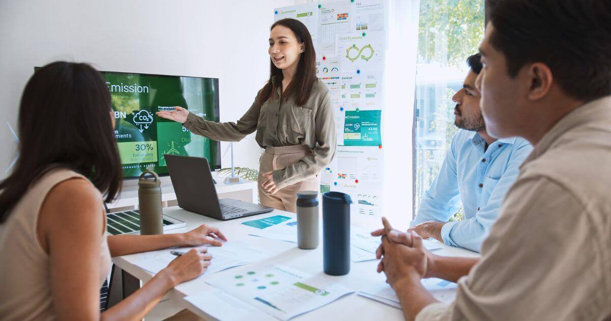 Someone giving a presentation with CO2 on the screen